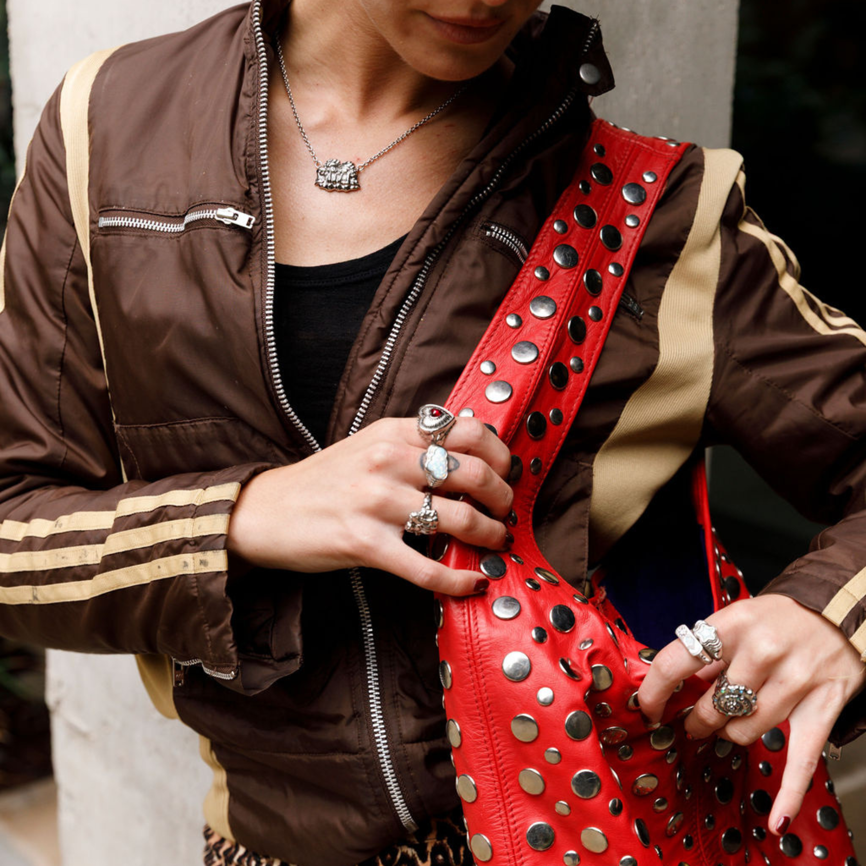 model wearing chunky cherub silver necklace.