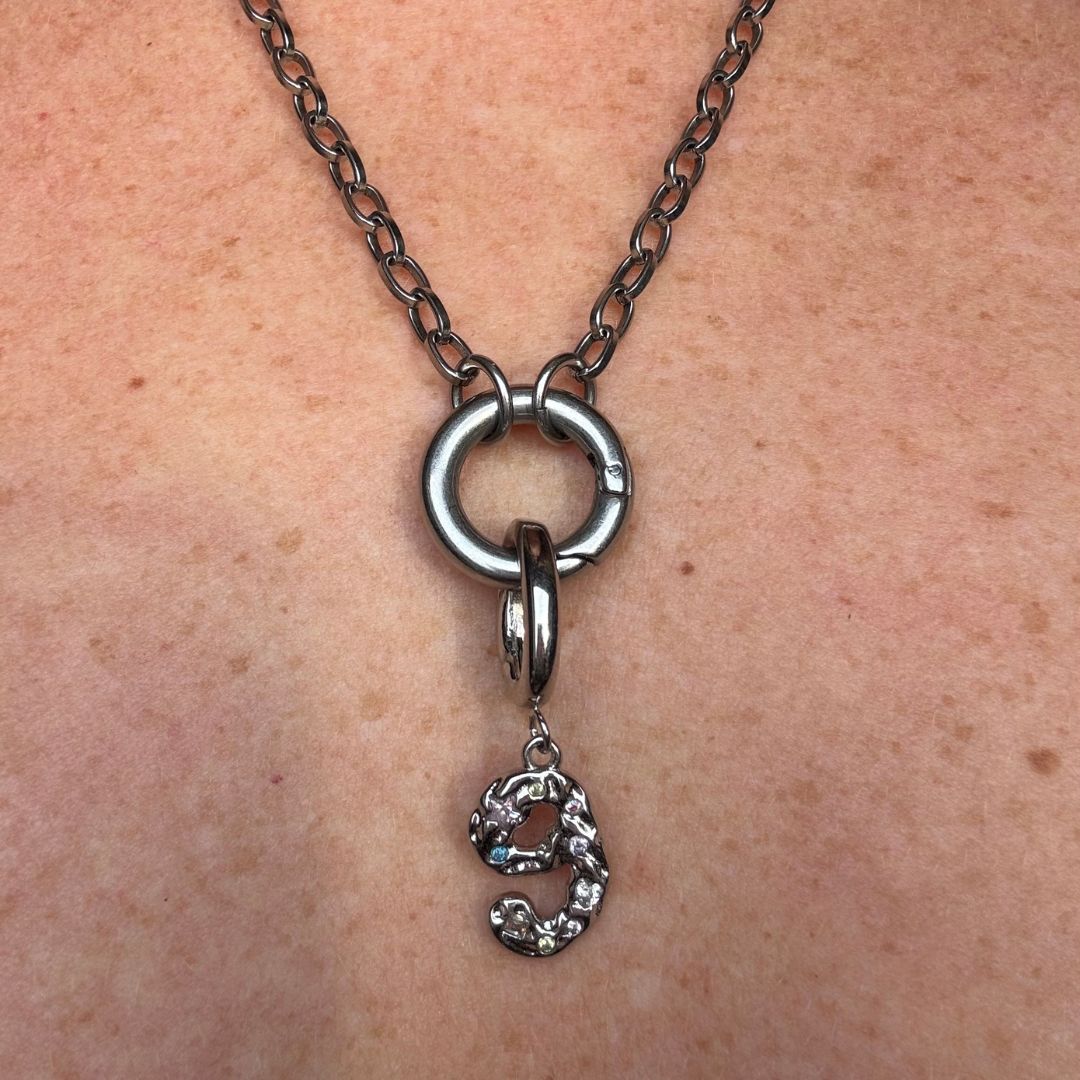 Nine – The Humanitarian Charm Silver