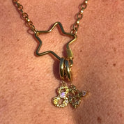 Nine – The Humanitarian Charm Gold