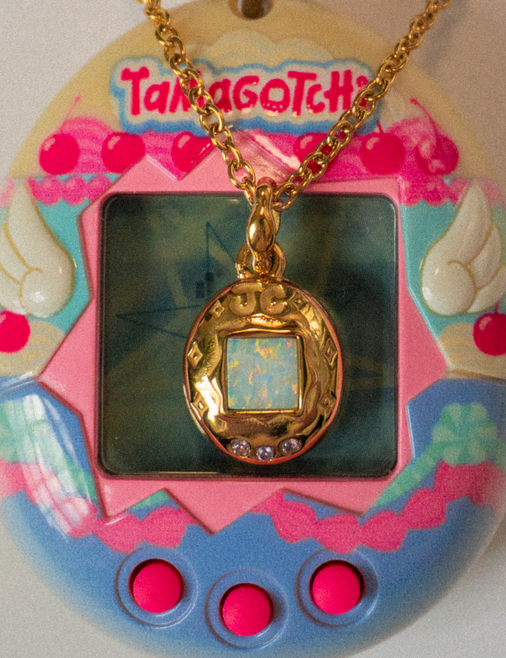 TamagotchiiGold_Necklace_JulyChild_2.png
