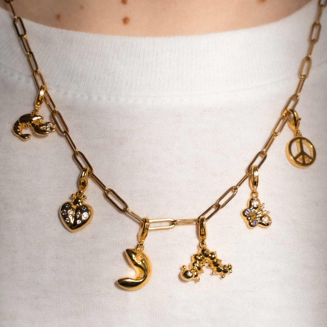 In a Pinch Charm Gold with Exclusive Sticker Sheet